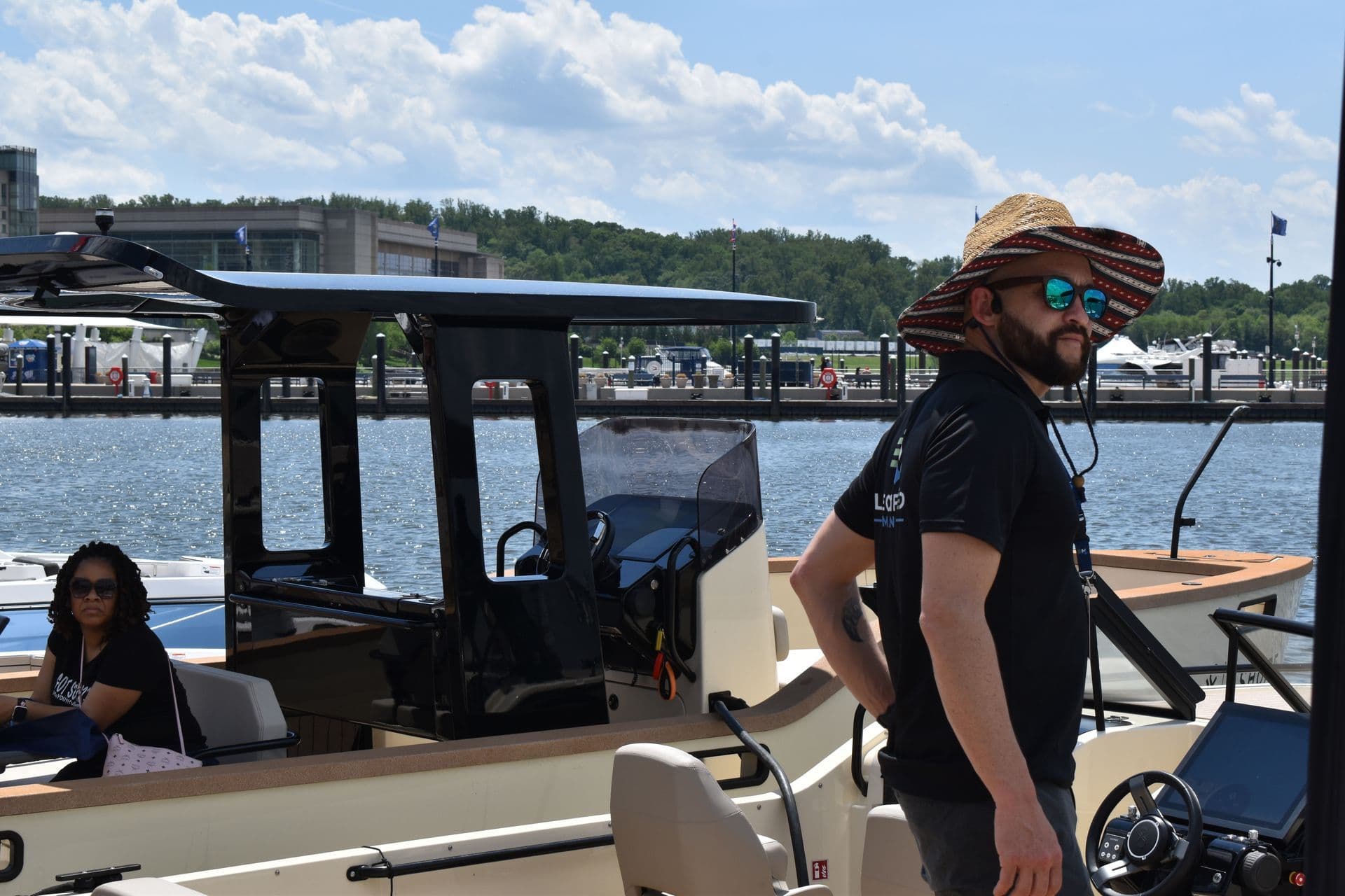 Electric boats docked at marina event