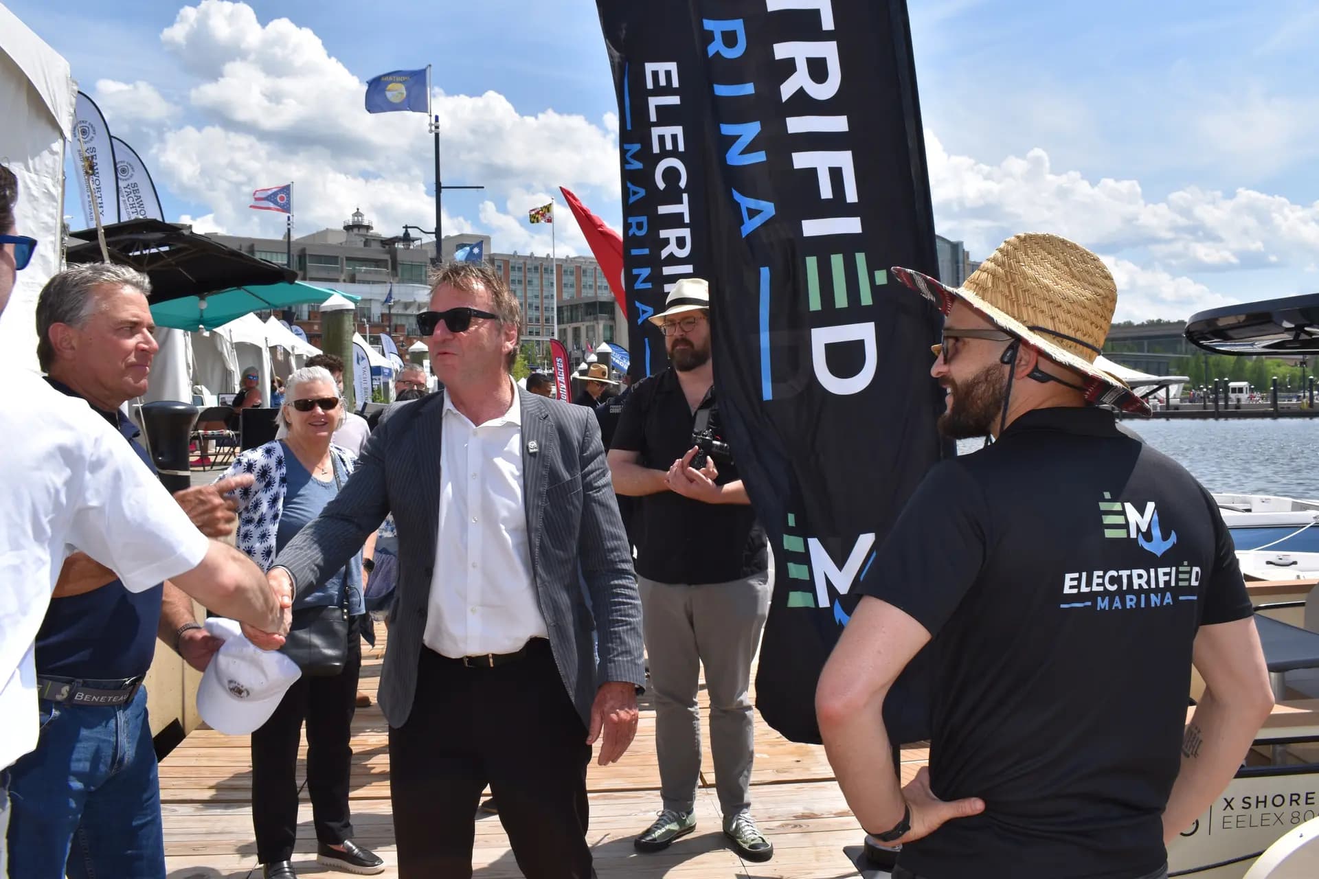 Electrified Marina answering questions at a boat show